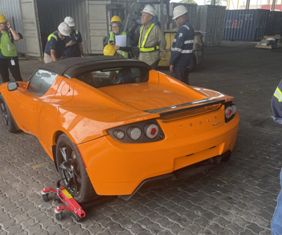 On The Lighter Side: Abandoned Tesla Roadsters Removed From Crates And Headed To U.S.