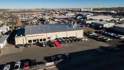 body-shop-surrounded-by-parking-lot