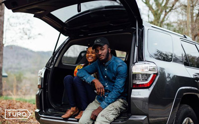 people-sitting-in-back-of-suv